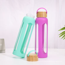 Стеклянная бутылка для воды на 1000 мл с силиконовой втулкой и бамбуковой крышкой